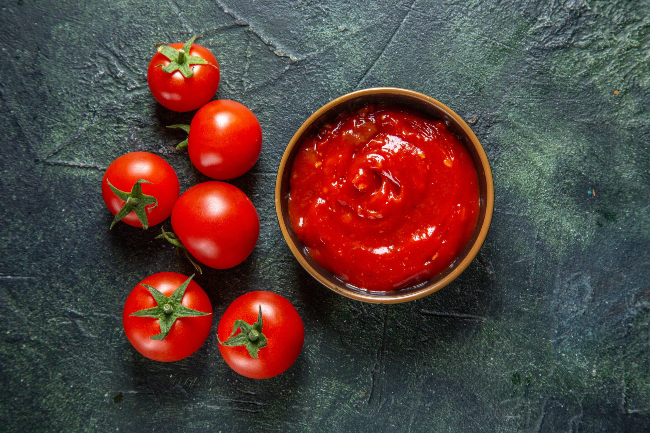 top-view-fresh-red-tomatoes-with-tomato-paste-dark-surface (1)